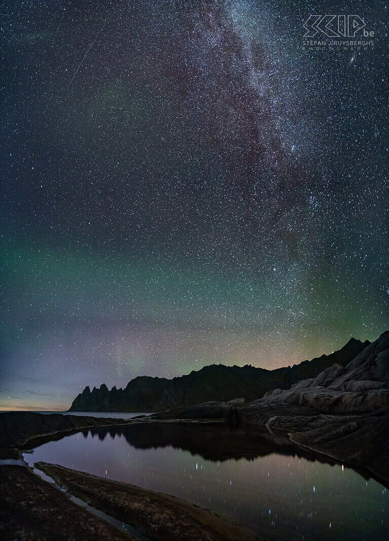 Senja - Tungeneset - Milky way The first northern lights appear very softly over the mountains on the rocky coast of Tungeneset around 11pm. The Milky Way is already breathtakingly beautiful and so I make a vertorama image. Stefan Cruysberghs